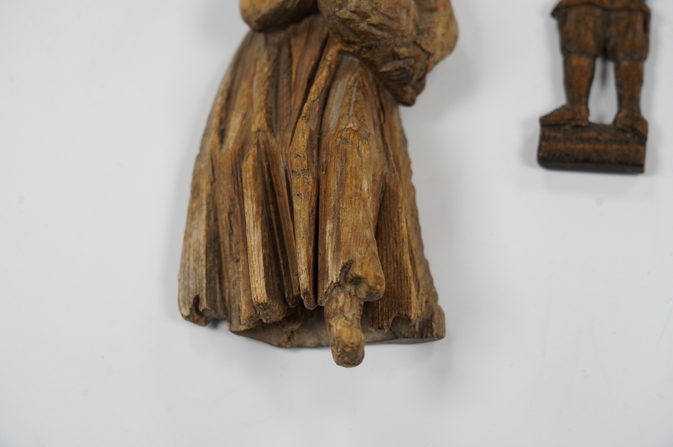 Two 17th century or earlier, European carved oak figures, tallest 20cm high. Condition - fair considering age